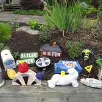          Saugatuck High School ceramic sculptures to stack on poles in garden; Later, these sculptures appear at the History Center/Center St. gardens in the summers.
   