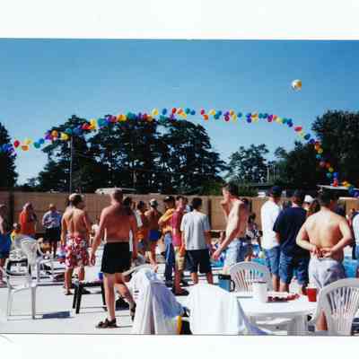 Camp_It1.jpg 461KB: Garland of balloons over a pool party