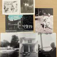          (8) Erma Cravens, Lorretta Mulvahill, & Clare Tracy, Michael’s mom, at Oval Beach -1958 (9) Up on the hill with my parents, Dell & Jim McFadden. (10) This is where I spent many wonderful summers (The Leland Lodge). (11) Here I am up on the hill with cousin Michael Tracy at the Bolton house.  I’m the one with a bow in my hair.  Don’t know who the other child is. - Summer 1947. (12) Island Queen. (13) Yard & one of the porches at the Bolton house. We use to take the stairs going up the hill to house. (13) My mon, Dell McFadden & Grandma, Emma Schotte 1958 on the Island Queen.
   