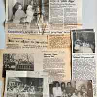          Newspaper clippings about the school; Ralph Troutman firefighter
   