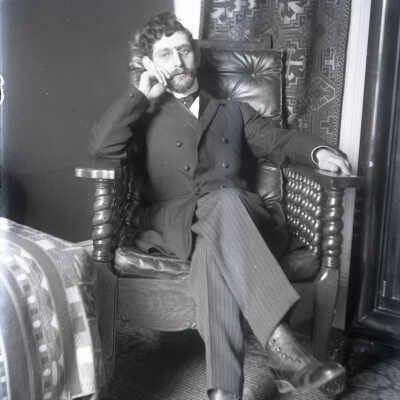 Gent in chair.jpg: one negative