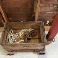          Fish scale, wooden fish box, rope and chain
   