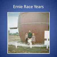          Mary McVoy sold the Barrel to Ernie Race in about 1961 or 62.  He was a disabled veteran.
Here is a picture of the four Race children and the barrel- Robert-8 yrs. old, Ernest-10 yrs. old, and Pamela -5 yrs. old, with Kenneth- 5 months. –
Mr. Race built the little two bedroom house to the rear and they lived in it.
The first year Melinda McVoy managed it for him. She did so doing both inside and outside duty for a summer.
Pamela Race Schweitzer reports:
“I remember my mother planting flowers between the sidewalk and barrel, and they bloomed all summer. I also remember a string of clear lights draped from the barrel to a pole, separating areas for cars from tables with umbrellas. There were also speakers outside, and “WLS in Chicago” playing the top hits all day which made it a popular place for people traveling to or from the Oval Beach. “
   