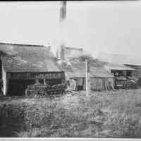          sk 142 Griffen & Henry mill.jpg 513KBfrom RJ&Diane Peterson collection. Digital file on Jack Sheridan Drive 2021.72.02; A man drives a horse-drawn wagon along the mill
   