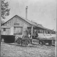          st105 Griffen & Henry.jpg 706KBfrom RJ&Diane Peterson collection. Digital file on Jack Sheridan Drive 2021.72.02; Workers lined up on the mill's porch with a horse-drawn wagon in the foreground. Print of this image 89-1-99_Griffin_Henry_Mill.jpg in box 31
   