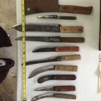          Collection of Demmy's very sharp knives; Also a handled sharpening stone and fish scaler
   