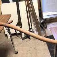          Scythe A has both hand grips
   