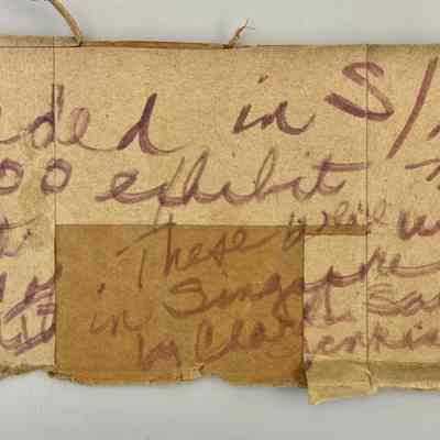 Note scrawled on cardboard box flap packed with group A: Note reads "Used in S/D Museum 2000 exhibit Ghost Towns [Lost and Found: Ghost Towns of the Saugatuck Area] These were used in Singapore MI by Charles Samuel Jenkins family."