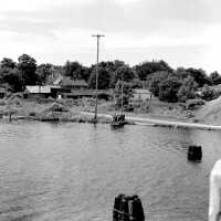          405 0/1	Douglas - churches, ferry	7/1945	Ferry landing near old St. Peter’s; View of Point Pleasant in Douglas, upriver from Blue Star Bridge. The new bridge is visible at the far right of the image.
   