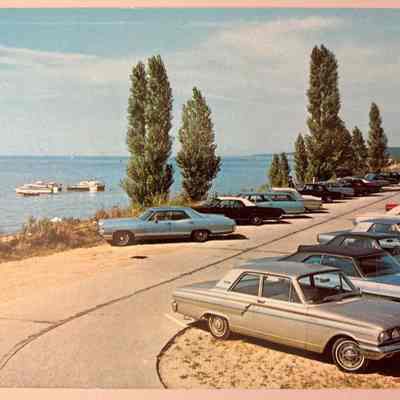 Oval Beach south parking lot front: Located in postcard binder 2 water