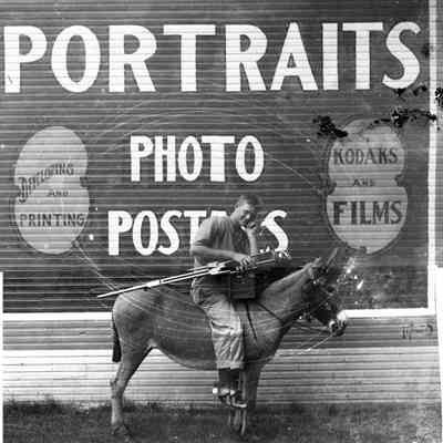 DynamiteSimonsonStudio 828KB: Simonson Studio photographer with his camera and tripod - portraits, developing and printing, Kodaks and films, photo posters