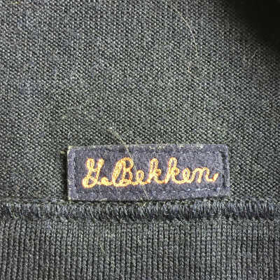 identification tag sewn inside the sweater along the waist