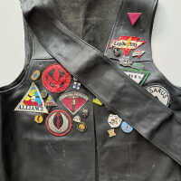          vest with snap-on sash
   