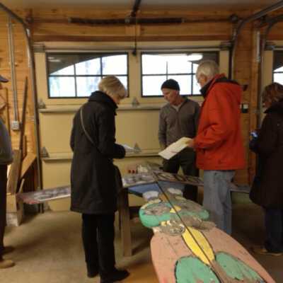 Dec. 8. 2011 totem restoration: Arnold Schafer, Judy Hillman, Jim Schmiechen, unidentified man and woman