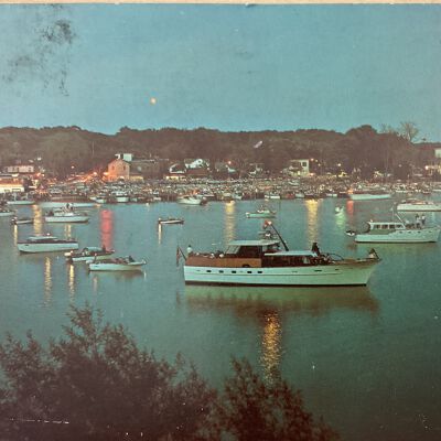 Postcard of the Saugatuck harbor at dusk