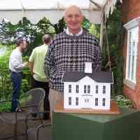 100_9447.jpg 1MB; Arnold Shafer posing with his model at a 2007 museum opening party.