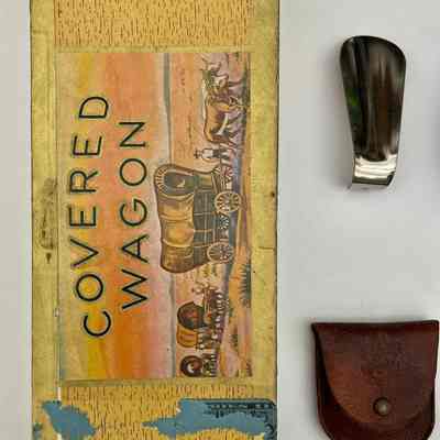 Cigar box closed (lid), shoehorn, pouch: Box is 5x2x11 inches