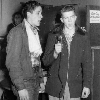Soda Lounge singers featured in SDHC exhibit Then and Now: Soda Lounge Singers circa 1949 
The Soda Lounge was a hangout in downtown Saugatuck and a particular favorite of area school kids. Once a year, store owners Ruth Wright and Vera and Mike Kinney would turn the place over to the “youngsters” for a Christmas Party that included sodas, sundaes and sandwiches free of charge. Festivities included an open mic featuring local talent, like the crooning duo of George Goshorn and Tom Maas.