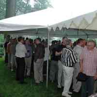          A rain storm did not dampen spirits.
   
