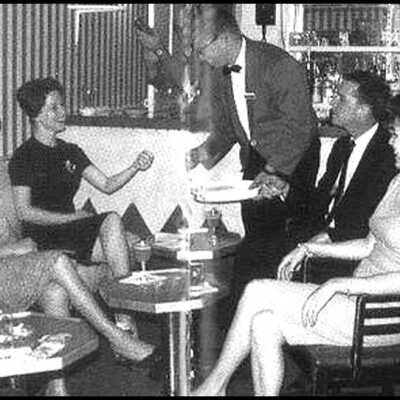 Ship’s lounge served cocktails & snacks.: lounge