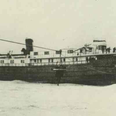 Argo-breeches-buoy-640x317.jpg from https://www.michiganshipwrecks.org/shipwrecks-2/shipwreck-categories/surf-zone-shipwrecks-lost-and-found/argo: This dramatic and thrilling rescue by the U.S. Life Saving Service from Holland was witnessed by hundreds of Holland citizens who gathered at the lake shore to watch the spectacle. There was no loss of life.