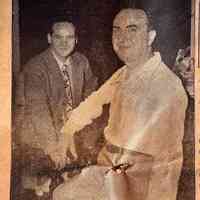          Joe Gerken, currently featured with his Hot-Hammond organ at the Dock, and Johnny Constantine, Pavilion manager, caught in a happy mood on the week-end as record-breaking crowds jammed Saugatuck and Douglas.
   