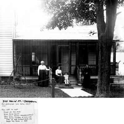 Richard_Ames_hse_344_Main.jpg 2MB: 344 Main St. Saugatuck - This photograph was taken about 1915. From left to right, friend of Mrs. Ames, Alice Ames Byron, Mary Ellen Byron (daughter of Alice), Mary Ames (Mother of Alice and wife of Capt. Richard Ames, who bought the house in 1857)