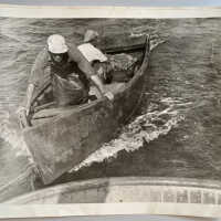          1; John Diepenhorst and an unidentified man in a dingy towed behind a fishing tug.
   