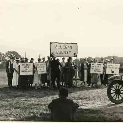 CWPC-0530AlleganCountyParadeGroup.JPG 173KB: Allegan County, We beat the world in peppermint, out numbers any county in U.S. in farms, we lead the state in standard schools, home of the big red.
