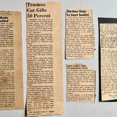 8. Five newspaper clippings