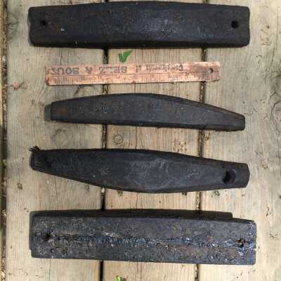 wooden objects thought to be hook line floats