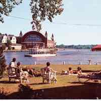          89-1-19D.jpg 872KB; People on lawn furniture gazing across Lake Kalamazoo toward the Island Queen and the Pavilion
   