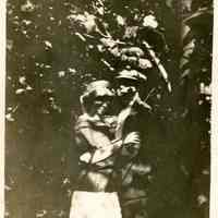          Auction_house_album_G.jpg 1MB; couple embracing in dappled shade of trees
   