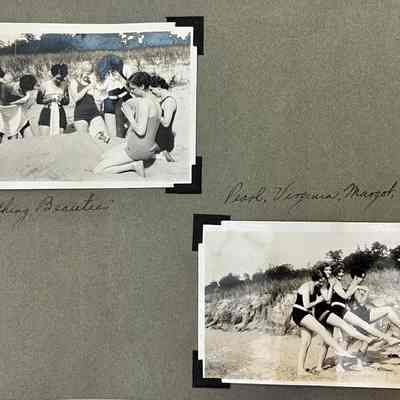 "Bathing Beauties" Young women weeping at mock burial in the beach sand