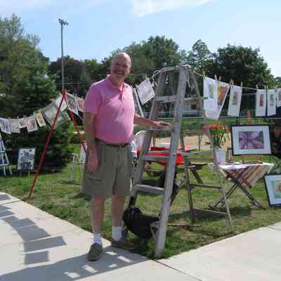 img_3508.jpg 2.5MB: Art Club president Jim Hansen at 2008 Clothesline art sale at Beery Field during 2008 SDHC Heritage Festival and Home Tour