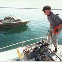         Trotter and Fish.jpg 438KB; David Trotter prepares to launch the sonar fish during Quest for the Chicora project. Photo by Valerie van Heest
   