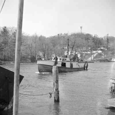 Thomas C Mullen ca 1958 fishing.jpg 451KN: with radar tower, Beachway and Holiday Hill ramp in background