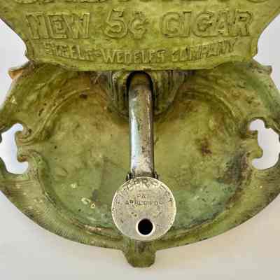 Cigar cutting arm "Finger Rest Pat. Appl'd For"
