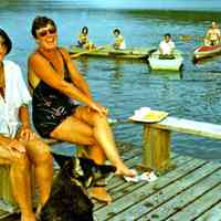         ConnieMaryK.jpg 857KB; Mary K. (left) and Connie Deam (right) with Smalley family members in background
   