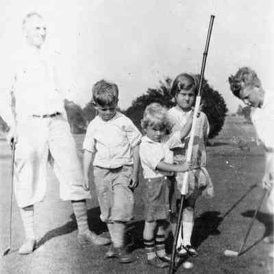 V.H.B. Sr., V.H.B. Jr., Irene, Irene Jr., Paul, Jack & Bob outside 1927.jpg: Holland Golf Course