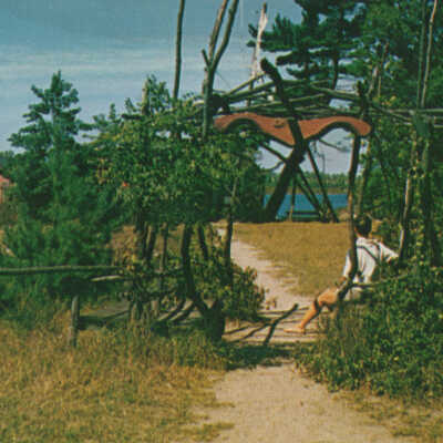 Ox-Bow Arbor with yoke in the meadow: S15811 Michigan Card Co., Grand Rapids