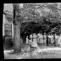          Herman Simonson photo of Taylor Studio; Note sign in upper left and the distinctive gentleman-artist wearing a pith helmet, jodhpurs and puttees or gaiters.
   