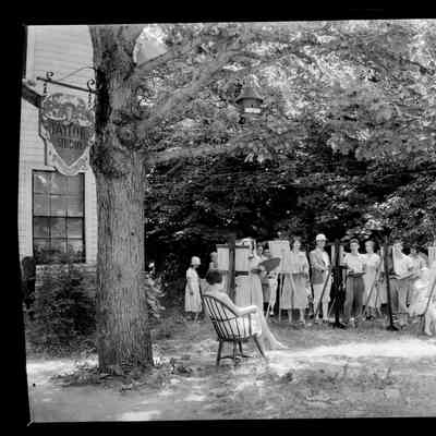 Herman Simonson photo of Taylor Studio: Note sign in upper left and the distinctive gentleman-artist wearing a pith helmet, jodhpurs and puttees or gaiters.