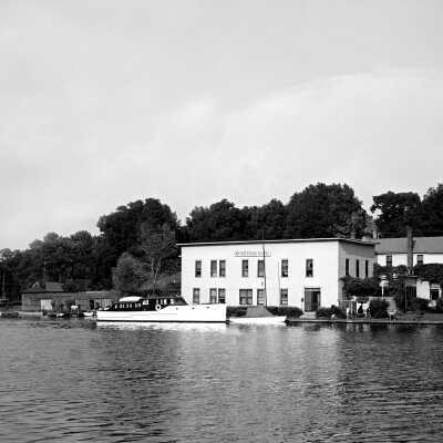 584 1/4	Saugatuck - cruisers	8/14/1949	Kareb docked at Mt. Baldhead hotel: AK studio and Walker's Saugatuck Boat Livery just down river