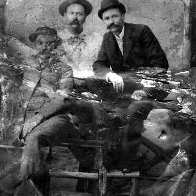 bf001.jpg 457KB: Three men with mustaches and hats posing for a studio portrait