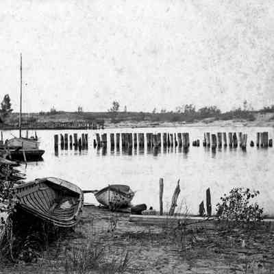 bf031.jpg 944KB: Row boats and sail boat at old harbor, possibly at Saugatuck lighthouse