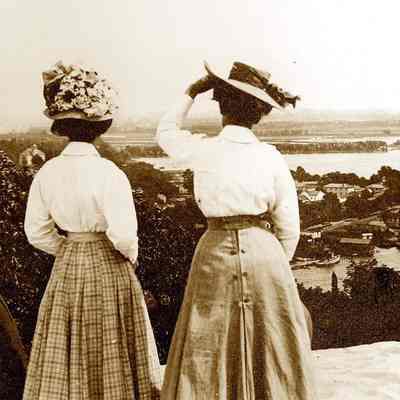 LadiesOnBaldheadca1910.jpg 1.2MB: Three ladies with long skirts taking in the view of Saugatuck and the Big Pavilion