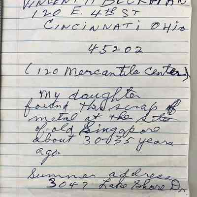 Note with sawblade fragment: 2003 note by Vincent H. Beckman reads "My daughter found this scrap of metal at the site of old Singapore about 30-35 years ago."