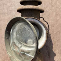 Lantern with glass lens