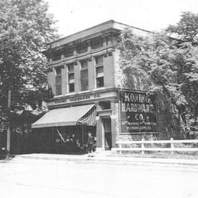Photo_2022-08-29_203857.jpeg 295KB: Mr. Faasen originally contacted the Archives to find "an original or higher resolution image the the enclosed shot of the Koning hardware building. This is only a copy of a scan printed on 8 1/2 by 11 copy paper."
